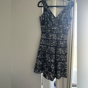 Beautiful black and white lace dress for sale , only wore once.